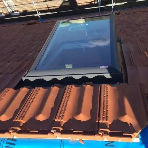Terracotta tile roof with new skylight — Blue Mountains heritage home
