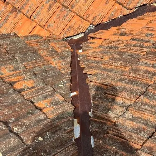 Weathered terracotta roof with moss and a rusted valley, before restoration — Blue Mountains